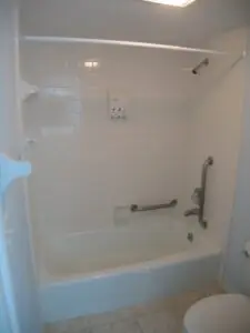 The bathtub before the remodel. It would become hazardous as the new owners aged