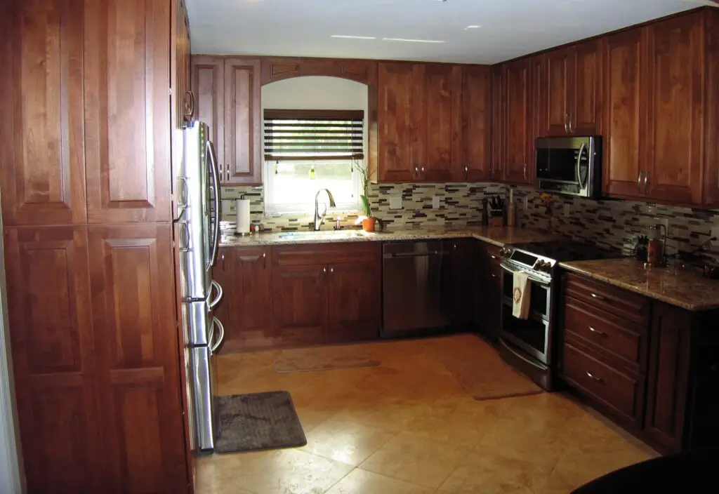 Washing wood cabinet in the kitchen only takes mild dish detergent and a soft cloth