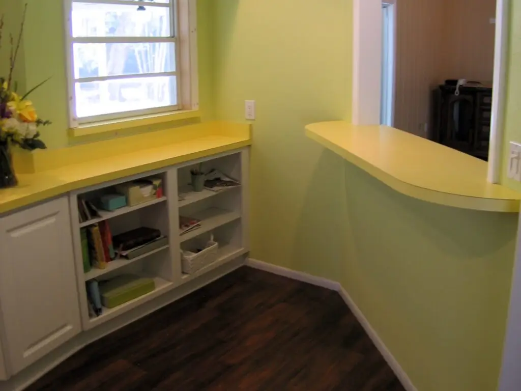 Creative storage solutions in the historic home kitchen with a focus on under counter bookcases