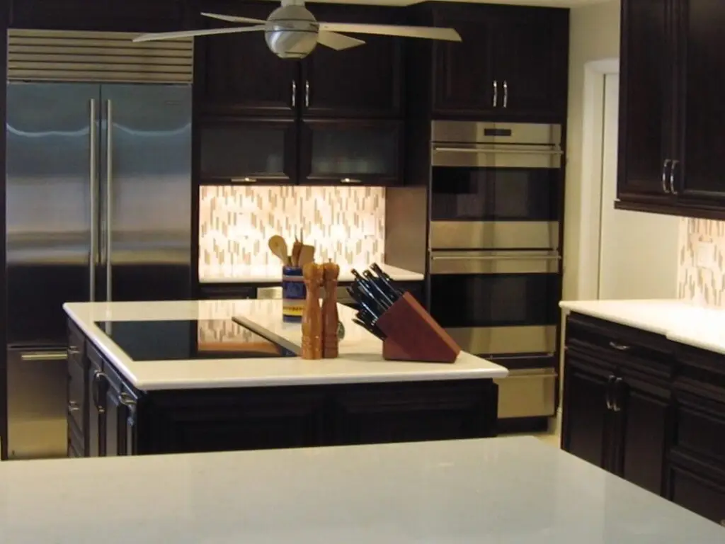 New kitchen design featuring an island and custom cabinets, courtesy of a professional remodeler