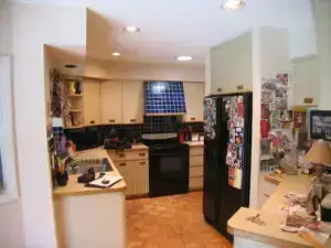 a before photo of a dated but functional kitchen in Sarasota's Palm Aire subdivision