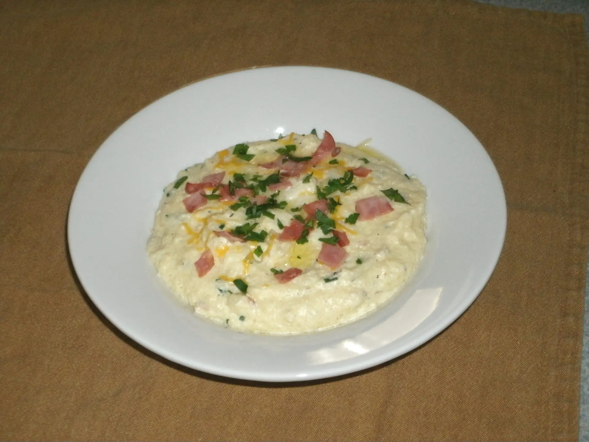 Three Cheese Grits Soufflé