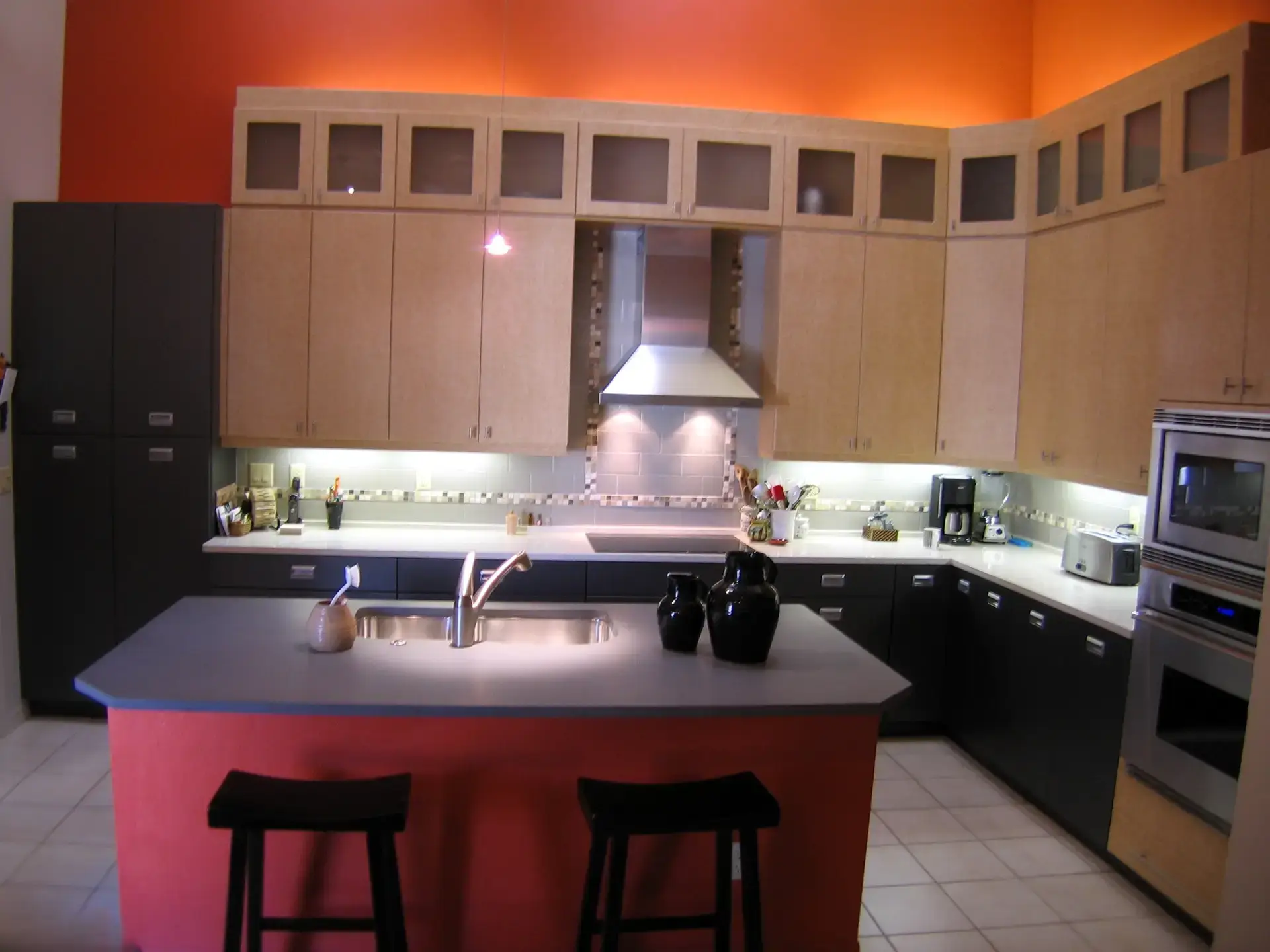 Birsdeye maple and charcoal cabinetry with Caesarstone countertops as part of a kitchen remodel in Prestancia