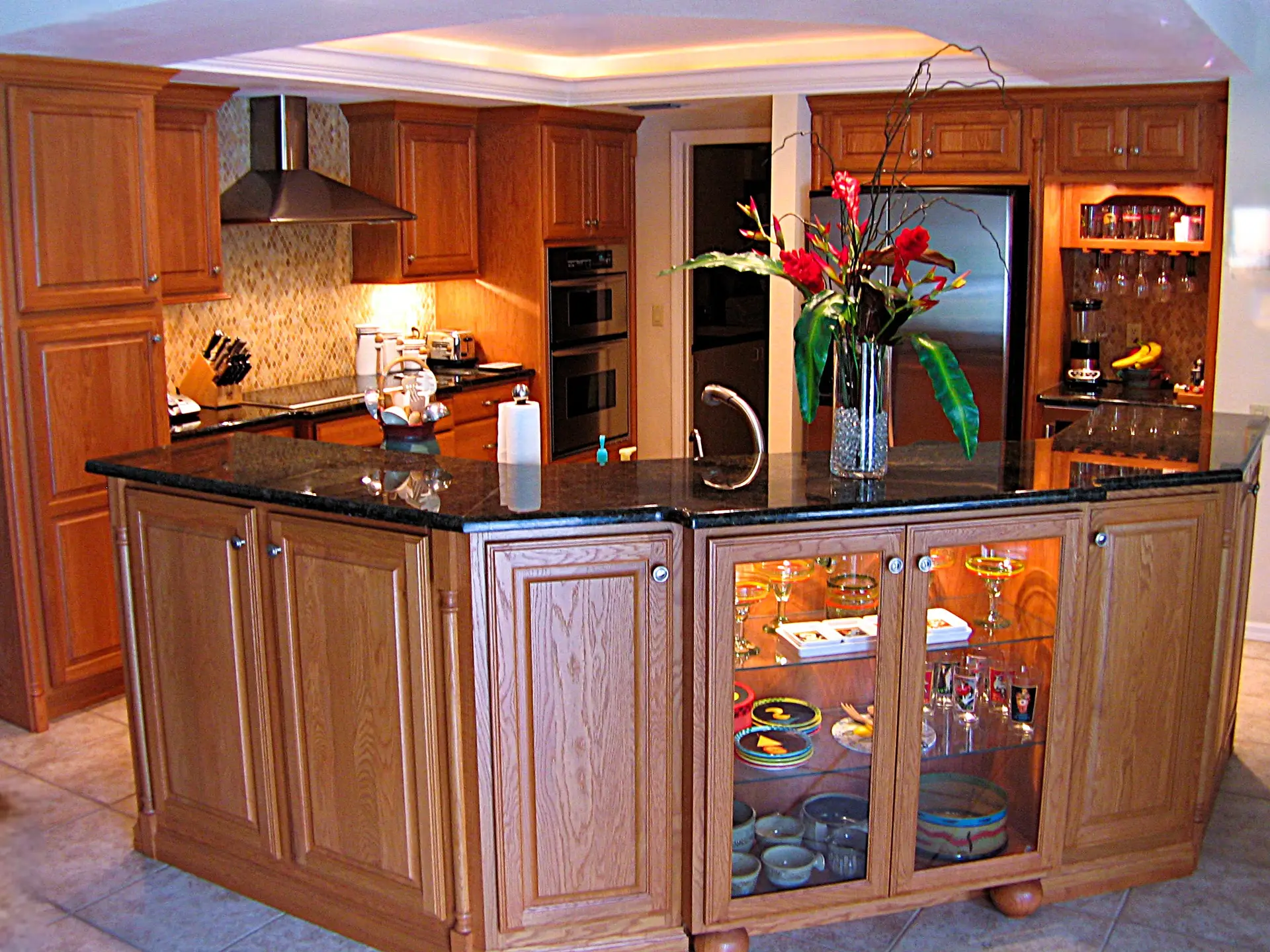 Sarasota kitchen remodel with entertaining nook and glass cabinet
