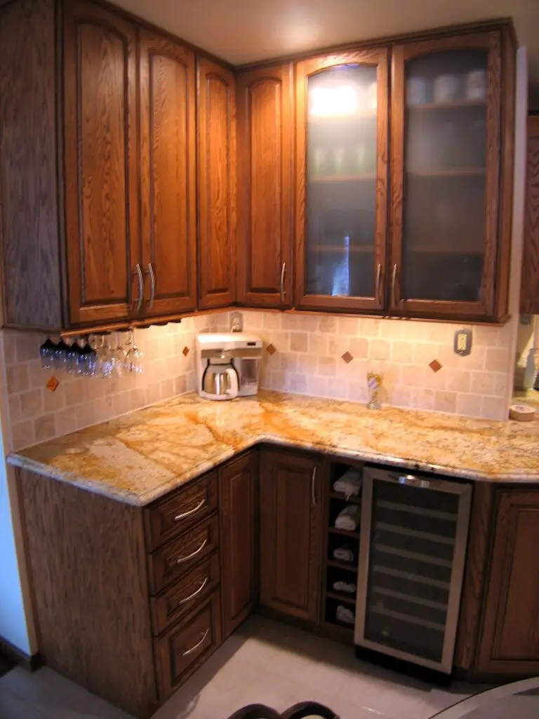 Wine fridge and stemware holder in remodeled Bradenton kitchen