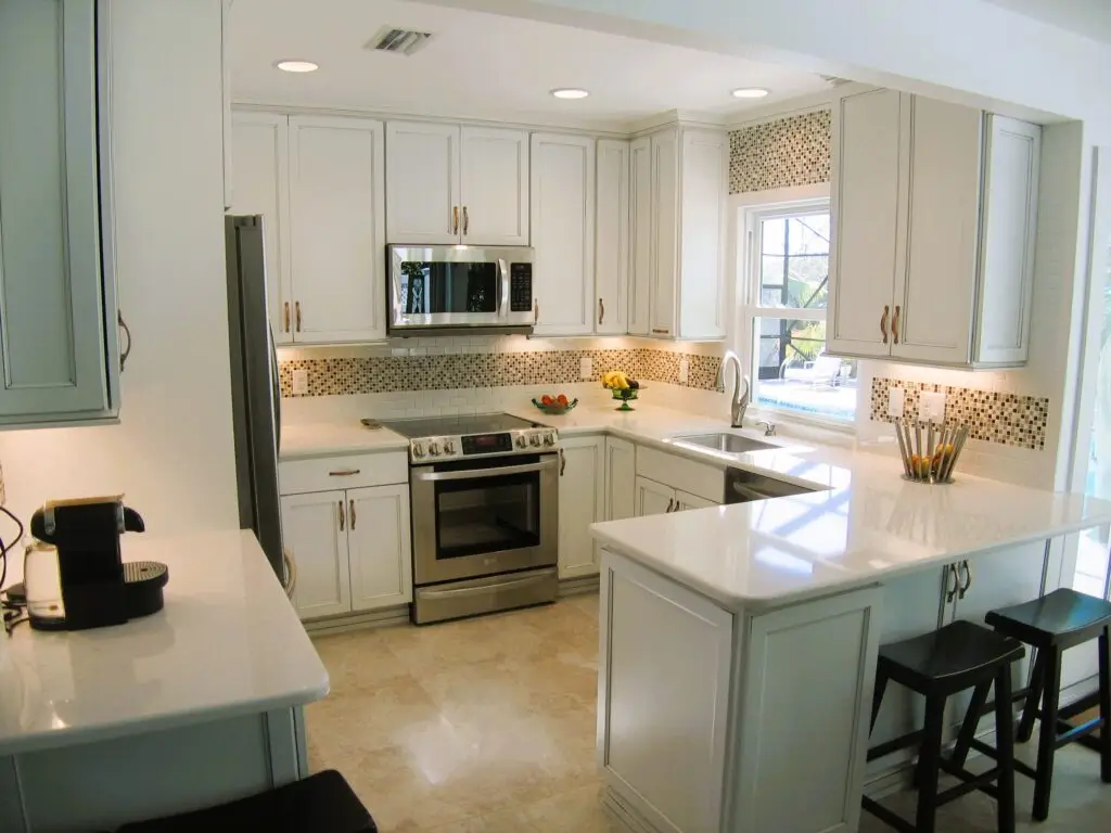 Longboat Key Cottage Kitchen Remodel with white StarMark cabinetry