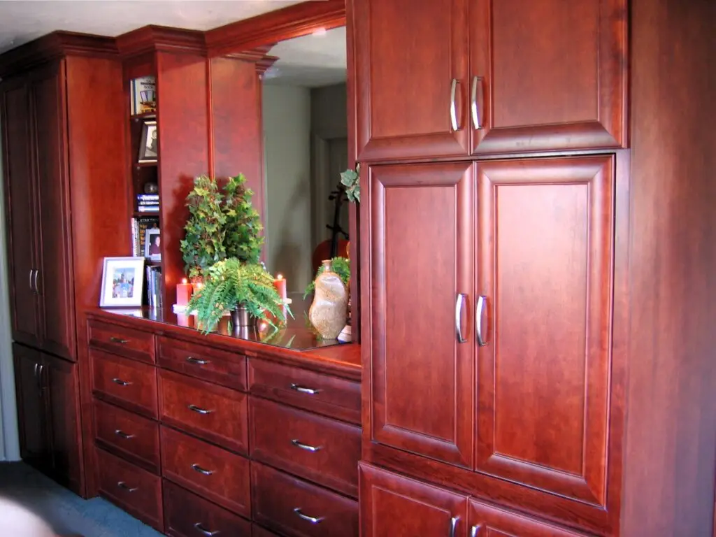 Full view of custom 14-foot built-in storage unit in a master bedroom