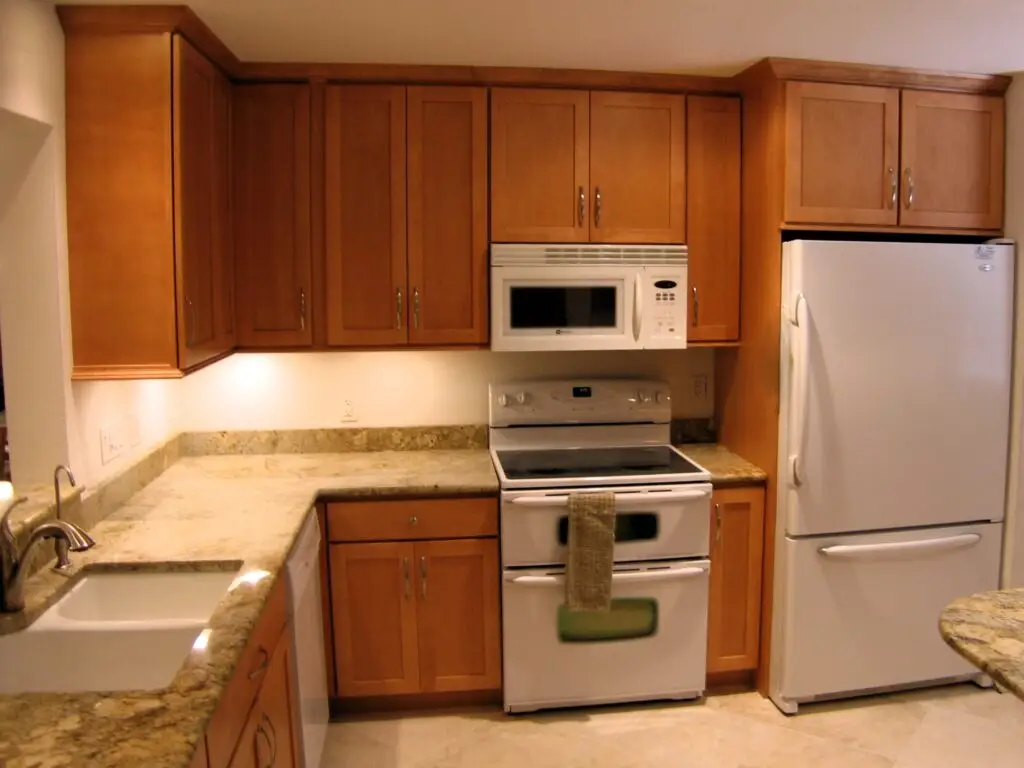 Honey finished cabinetry, a perfect neutral tone to appeal to homebuyers