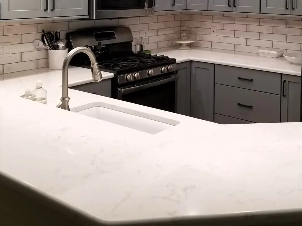 a subtle and consistent quartz countertop in a modern kitchen