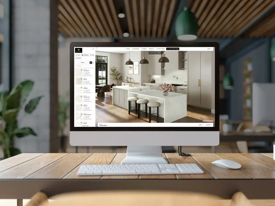 Screenshot of the Cambria Room Visualizer tool showing a kitchen with different countertop designs applied