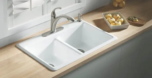 Classic cast iron drop in kitchen sink with a double bowl configuration