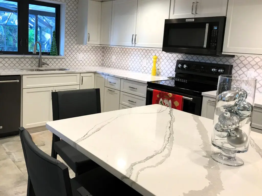 A modern, clean kitchen with clutter-free countertops and a sleek minimalist design