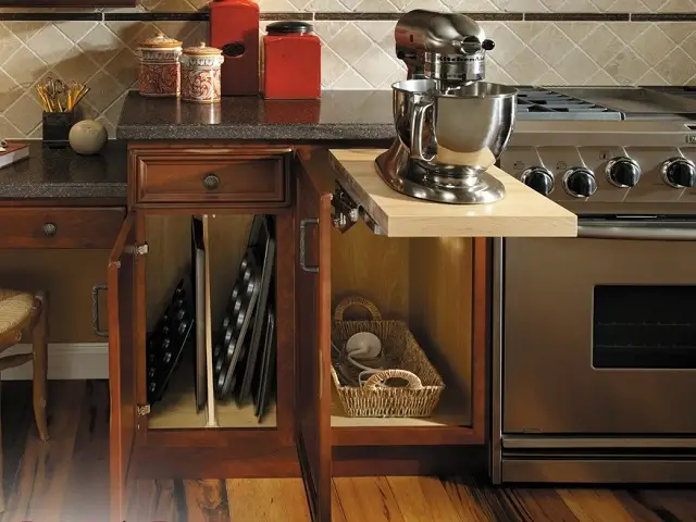 stand mixer on a pull out shelf organizing kitchen for holiday baking