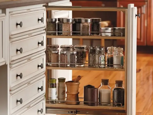spice pull out rack with organized jars for baking
