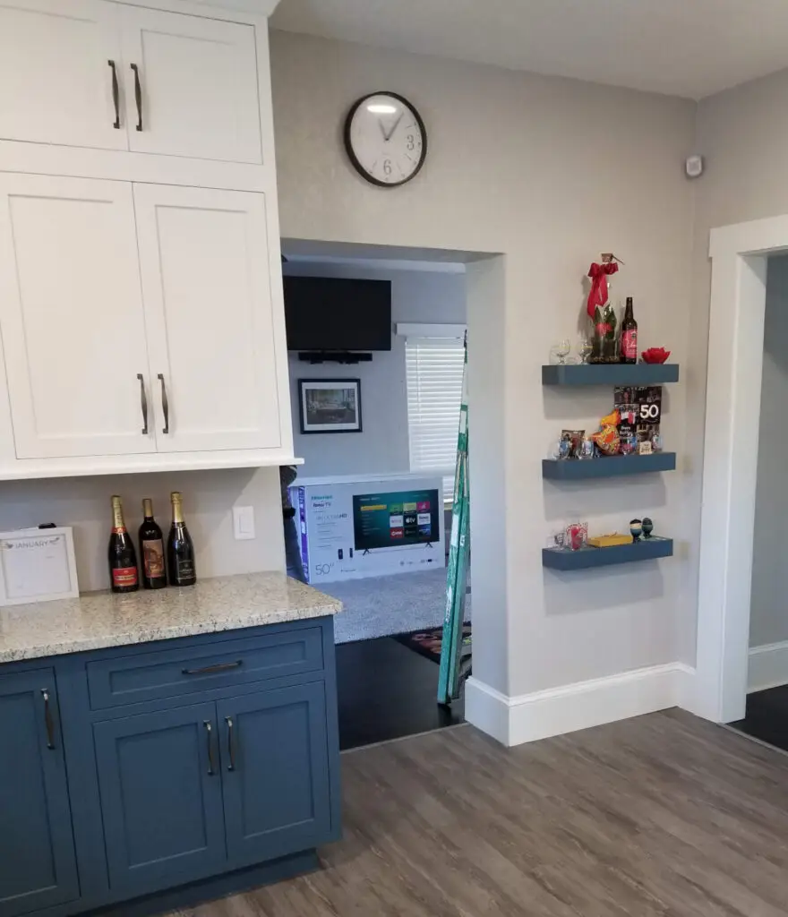 Stacked kitchen cabinets and display shelving for collectibles