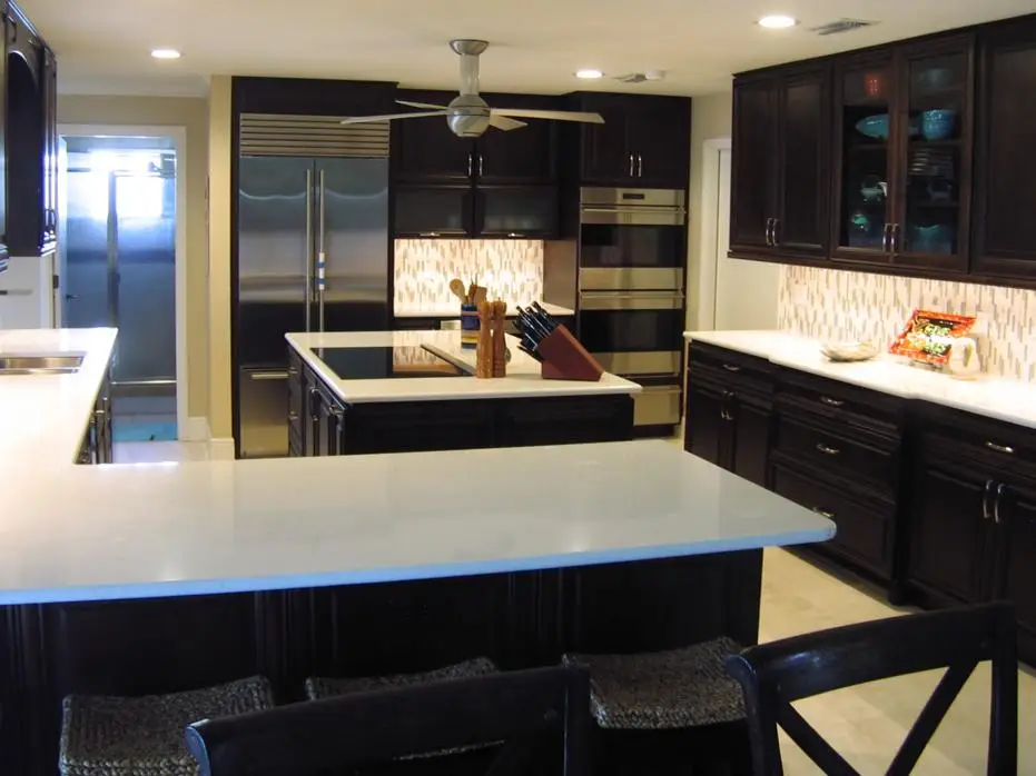 Sufficiently sized walkways in a kitchen are imperative both for function and safety, as shown in this recent kitchen remodel