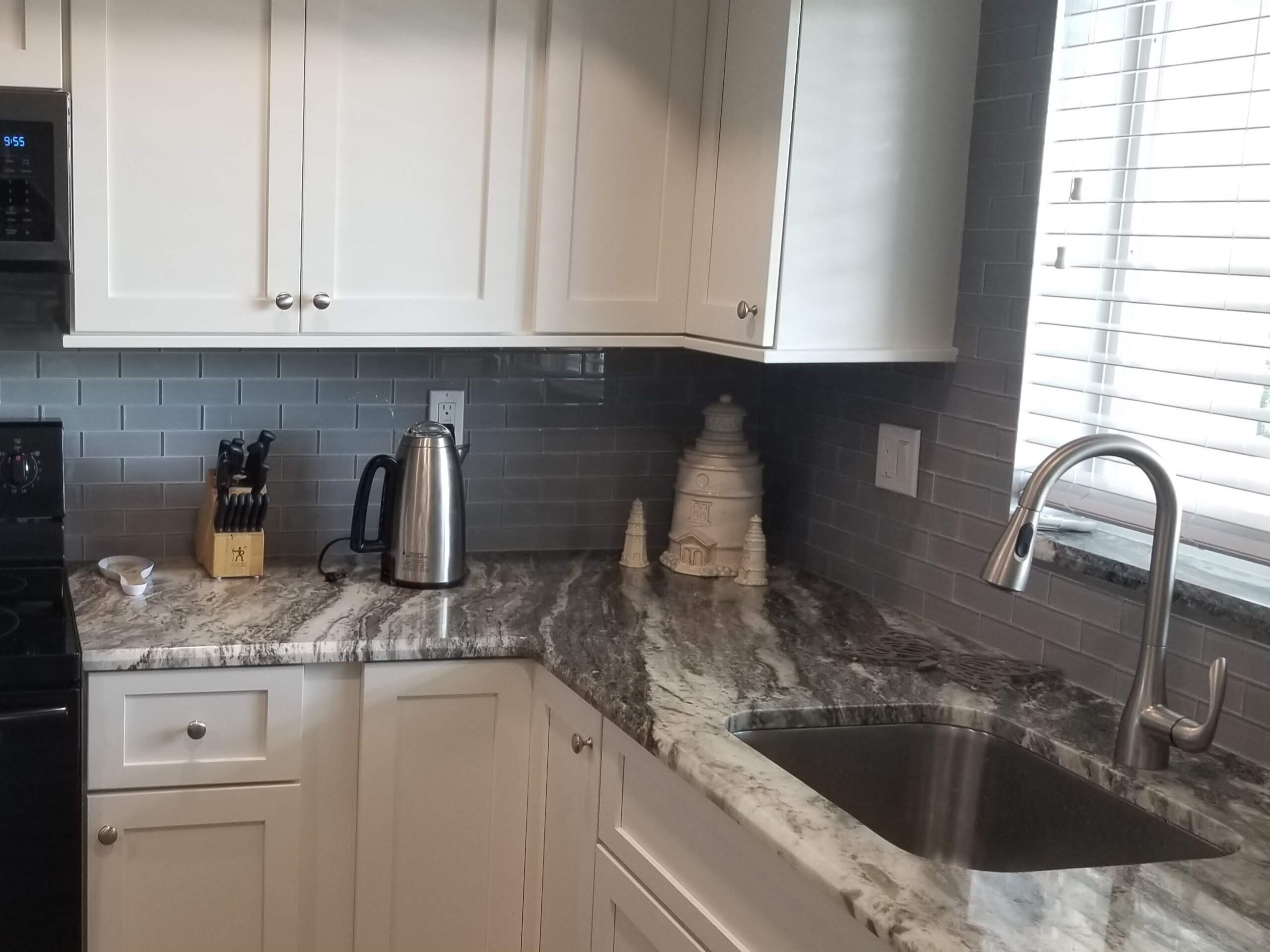 Modest condo kitchen remodel by Duncan's Creative Kitchens, perfect for Florida part-time residents.