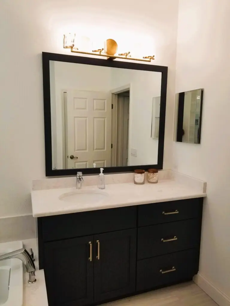 Close-up of a StarMark Cabinetry vanity with Cambria Torquay counters