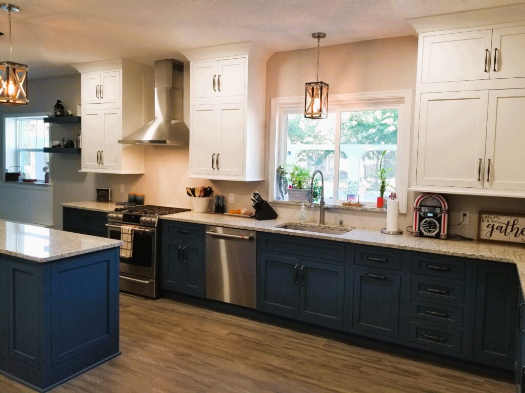 A beautifully styled kitchen with new countertops, appliances, and a seamless flow, representing a finished kitchen remodel project