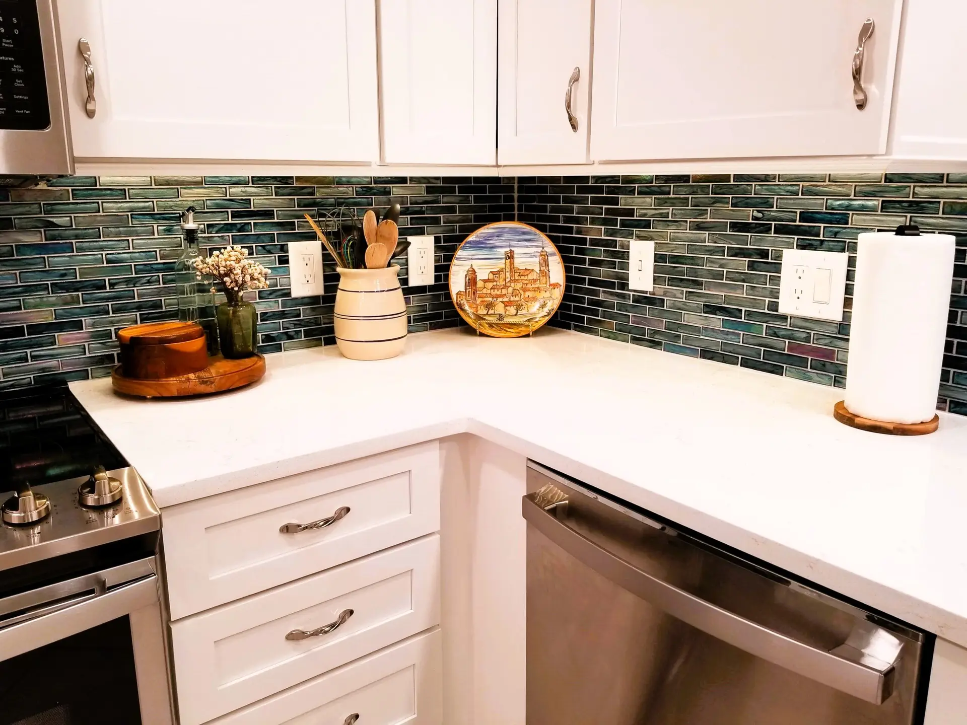 Close-up of iridescent blue and green tile backsplash