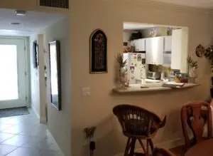 Enclosed kitchen with small pass thru before remodel