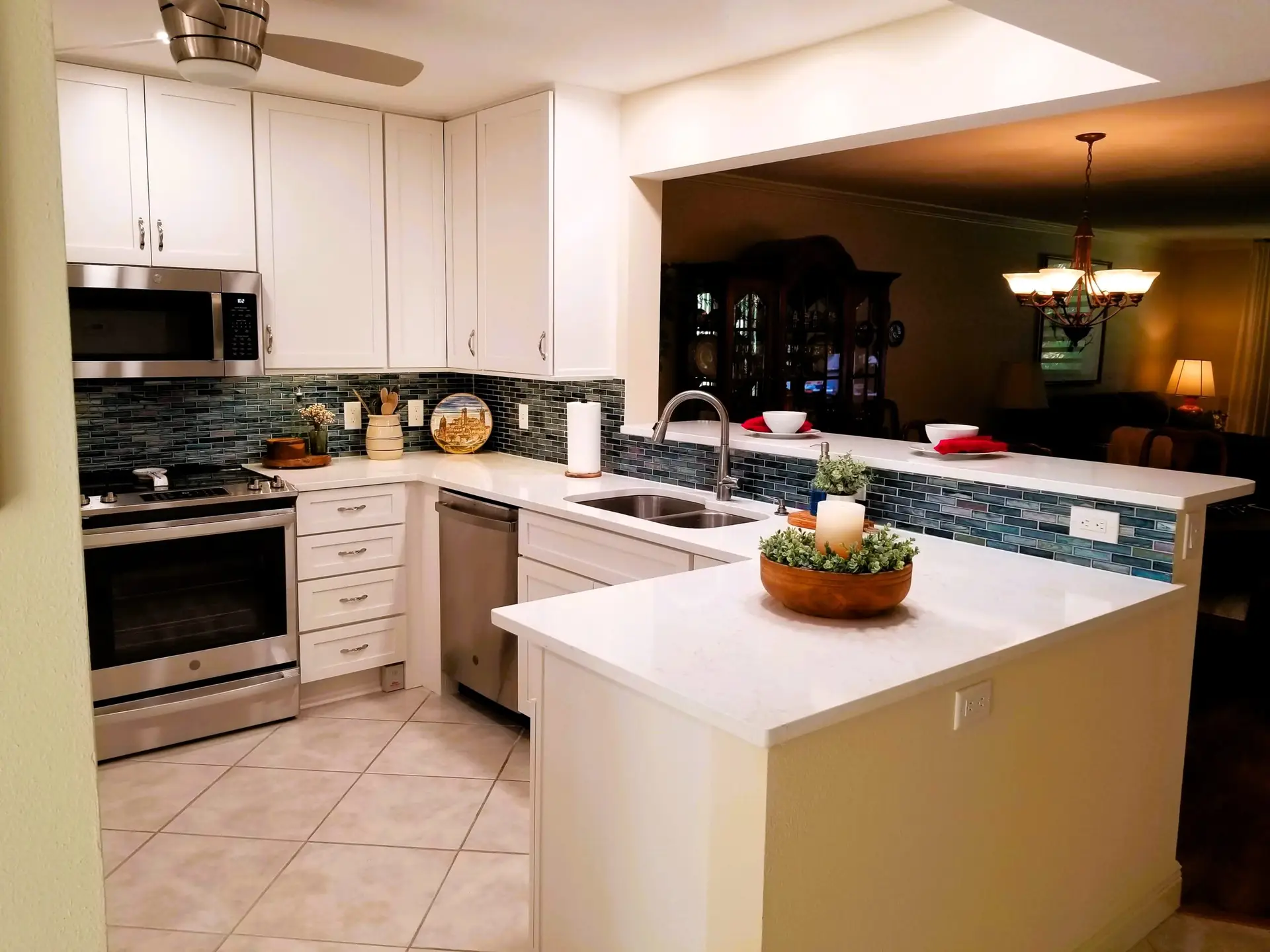 Remodeled Bradenton kitchen featuring two tiered bar
