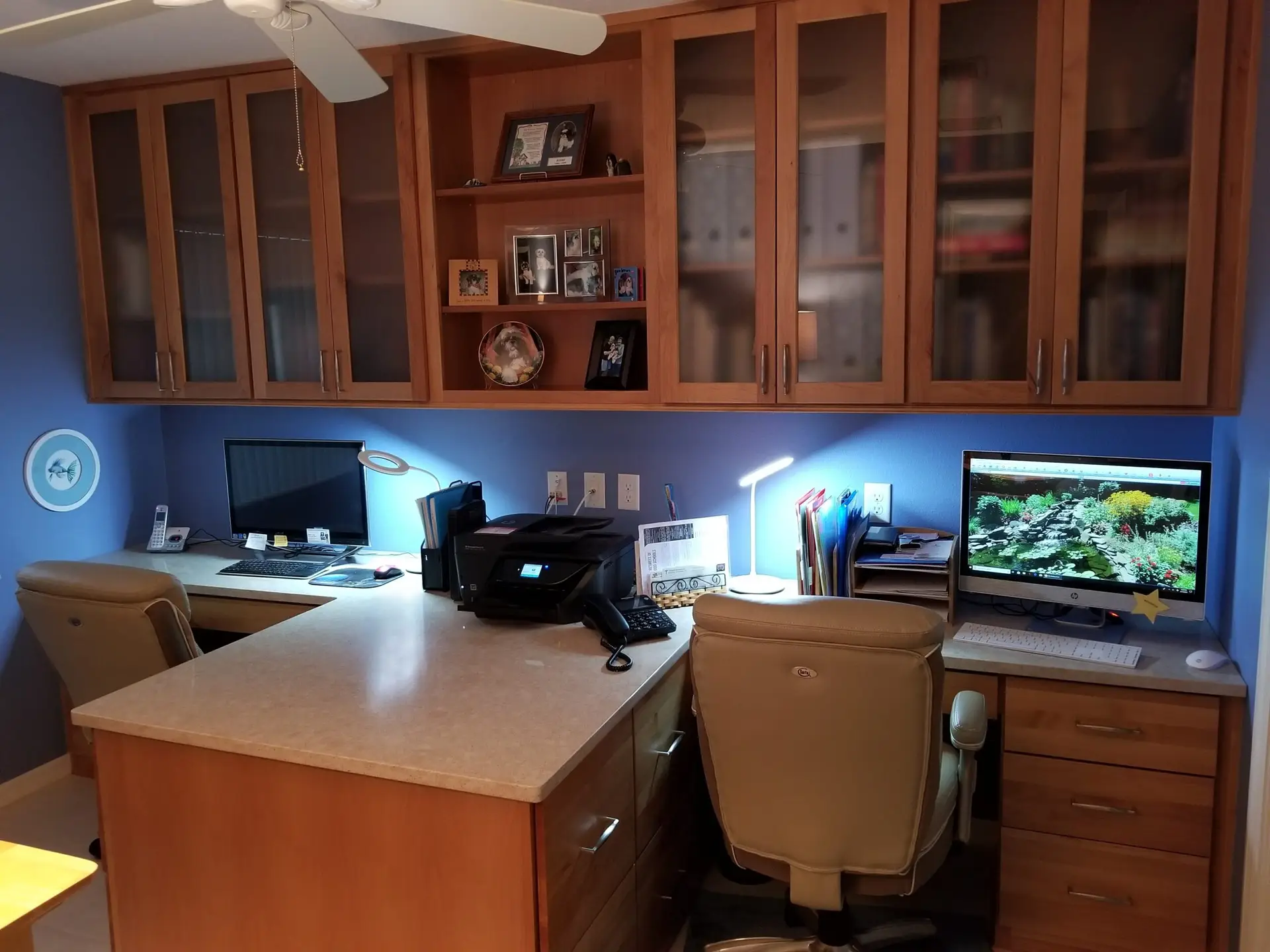Custom built dual home office with alder cabinetry and quartz countertop