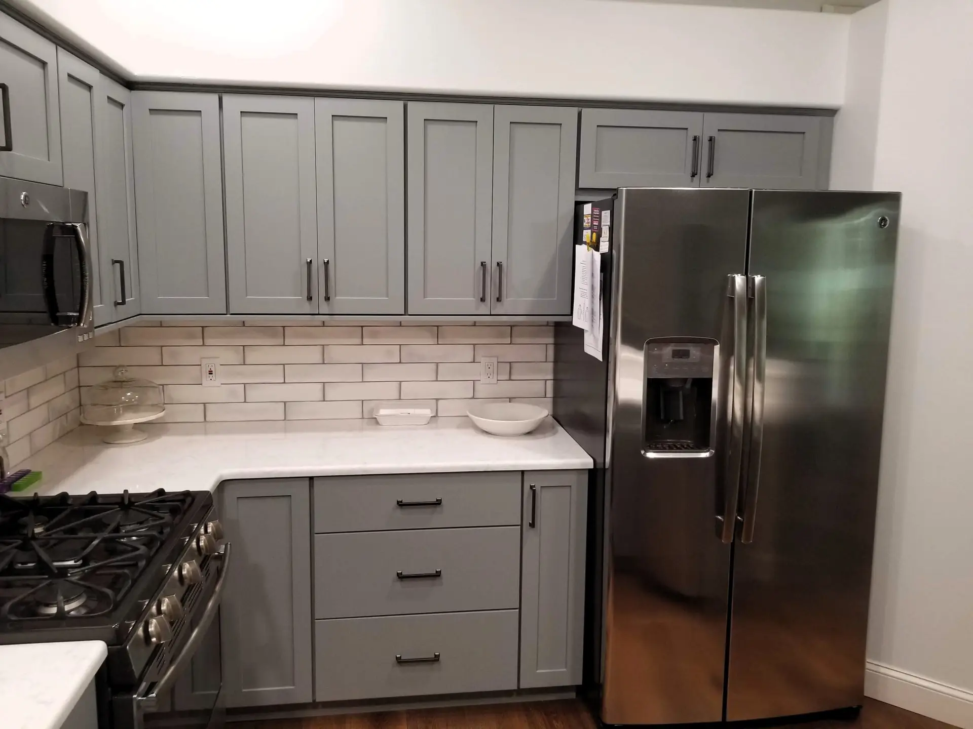 Kitchen storage accessories including deep drawers and trash pull out