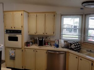 Outdated mobile home kitchen before remodel in Ellenton, Florida