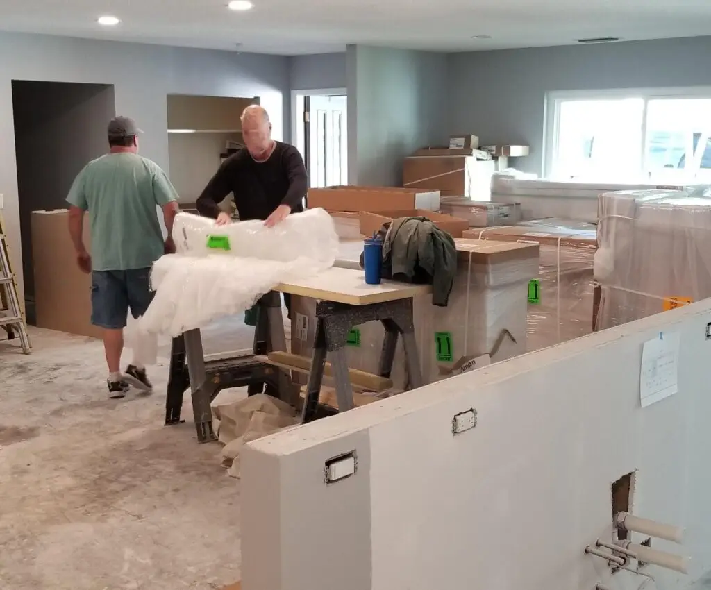 Skilled trim carpenter working on a kitchen remodel