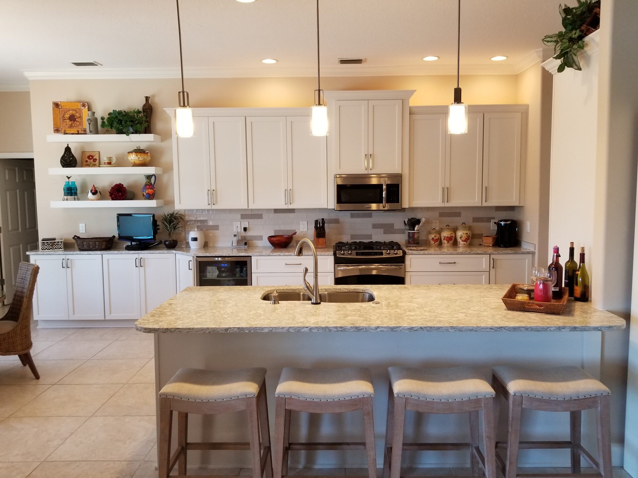 White shaker kitchen with quartz countertops maximum resale value Florida