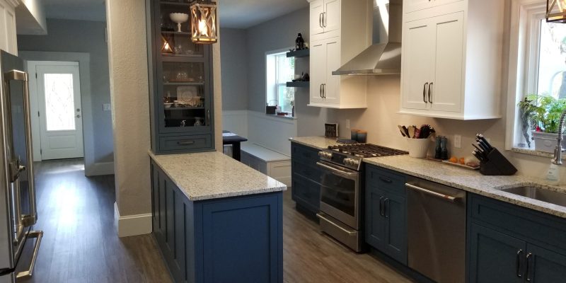 Modern kitchen remodel with blue and white cabinets and quartz countertops by Duncan's Creative Kitchens